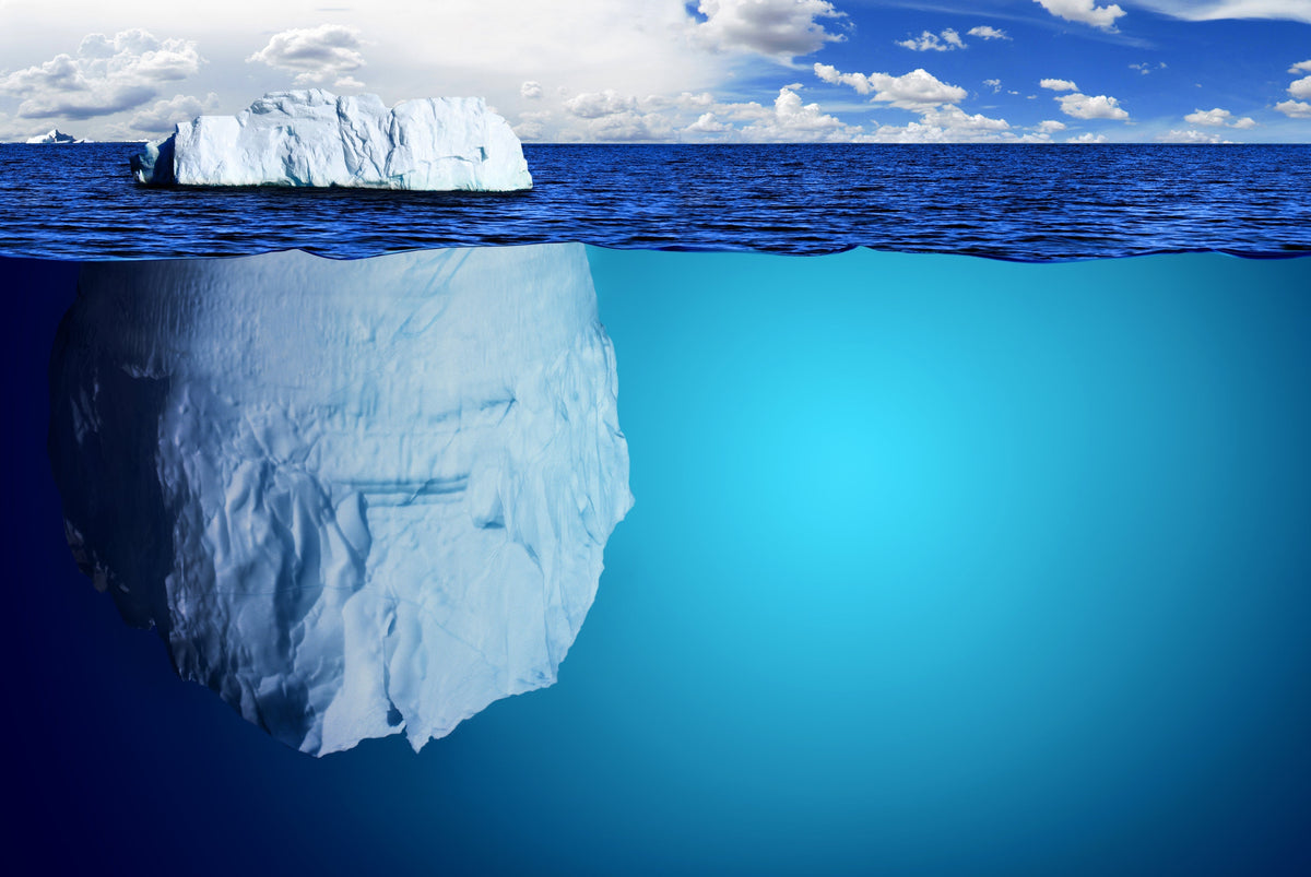 Iceberg with its tip above the surface and the larger part underneath